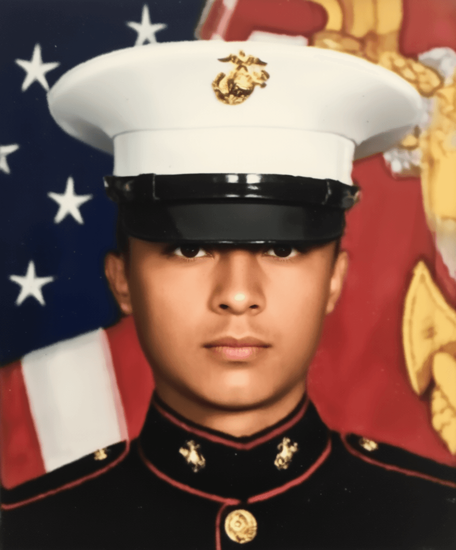 Marine in dress blues uniform with white cover, 2015