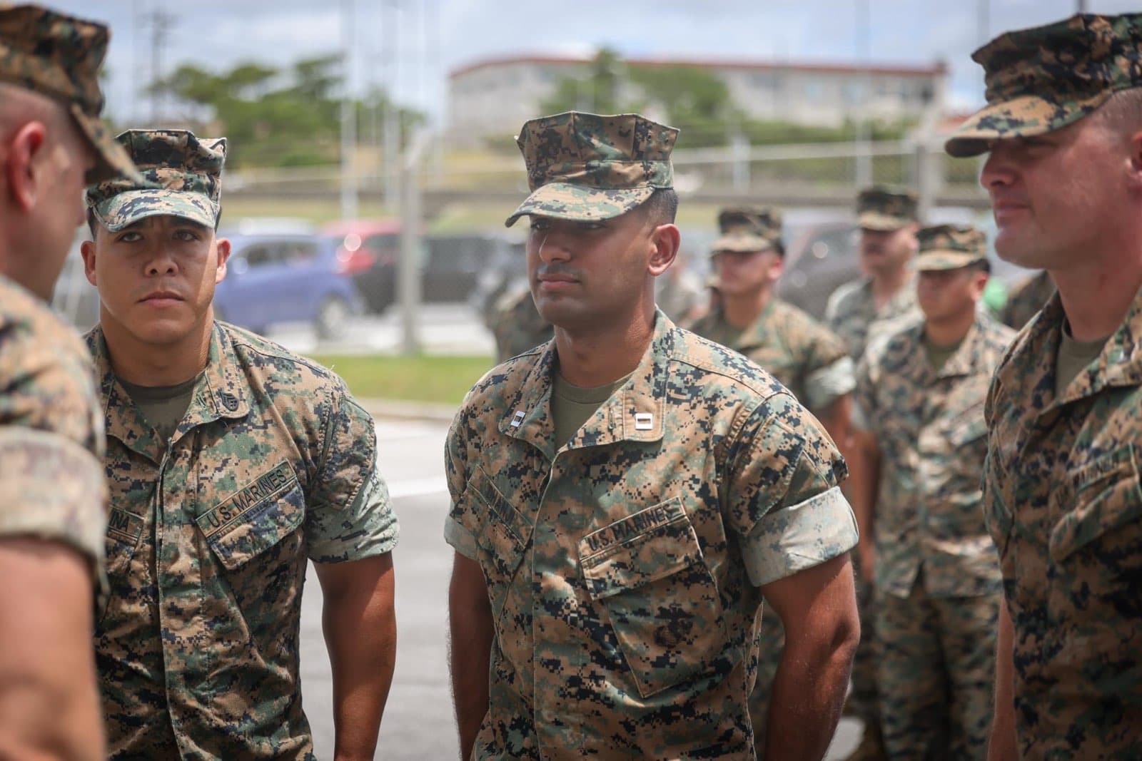 Marine Captain in formation with Marines during deployment